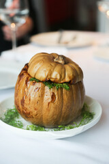 Stuffed roasted pumpkin with herbs