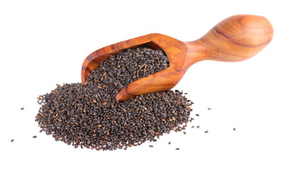 Basil seeds in wooden spoon, isolated on white background. Ocimum basilicum.