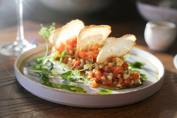 Salmon tartare with avocado and chips