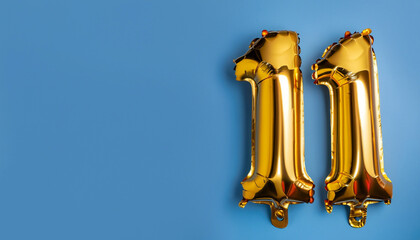 Banner with number 11 golden balloon with copy space. Eleven years anniversary celebration concept...