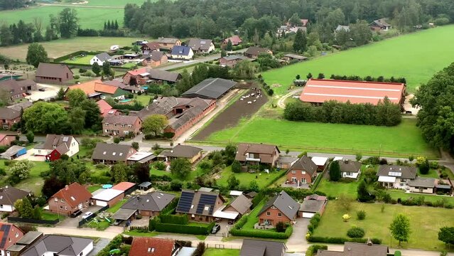 Aerial view of new development with single family houses as new part of old village in Germany