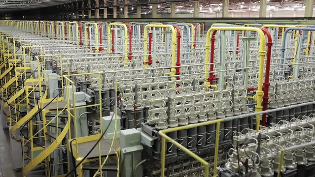 Vast Number Of Gas Centrifuges In Orderly Rows. Advanced Apparatuses Used In Power Engineering. Nuclear Fuel Production In Power Engineering. Power Engineering Provides Energy By Uranium Enrichment.