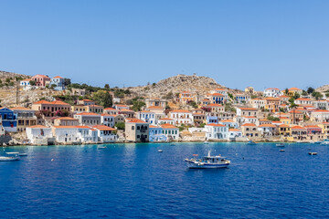 The Enchanting Island of Chalki: Beautiful Houses, Stunning Beaches, and Authentic, Charming Harbor