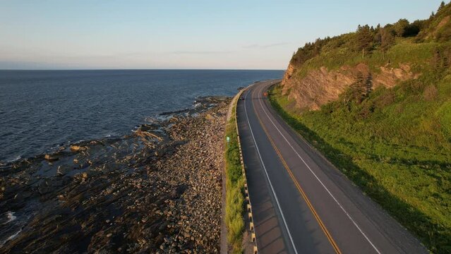 Aerial approach of coastal highway in Gasp&eacute;sie Qu&eacute;bec