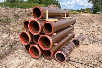 Industrial Pipeline Landscape. Big Brown Pipes at Building Site