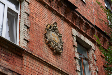 An interesting emblem on an old brick house in the center of Kharkiv