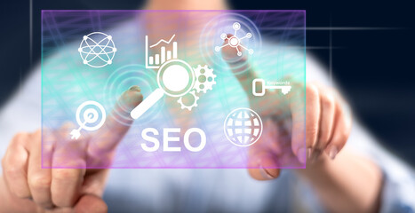 Naklejka premium Woman touching a seo concept