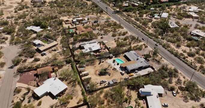 Tucson Arizona Aerial v3 birds eye view flyover Casas Adobes neighborhood capturing Casas Catalinas homes, tilt up along Orange Grove road to desert mountainscape - Shot with Mavic 3 Cine - March 2022
