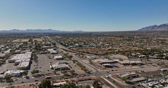 Tucson Arizona Aerial v10 flyover Woodland Hills neighborhoods capturing Tanque Verde Creek and barren desert landscape with spectacular rocky mountainous views - Shot with Mavic 3 Cine - March 2022