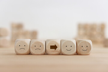 Top view image of table with note of happy and sad face. concept of happiness emotion and satisfaction - obrazy, fototapety, plakaty