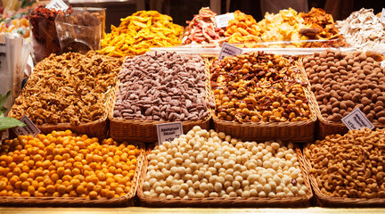 Nuts and dried fruits on the counter in the market