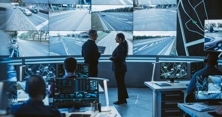 Team of Software Developers, Engineers and Data Scientists Working in a Modern Logistics Technology...