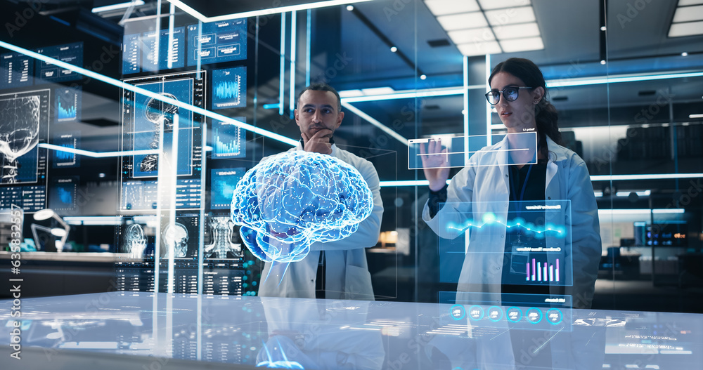 Aufkleber Two Neuroscientists Working With Computer-Powered VFX Hologram Of Human Brain And Nervous System In Futuristic Laboratory. Multiethnic Man And Woman Working On Solutions for Brain Tumor.