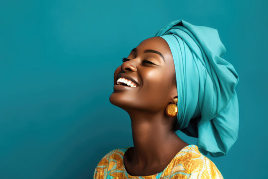 Beautiful Young Happy Nigerian Woman On Blue Background