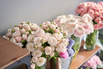 Many different flowers on Showcase. Background of mix of flowers. Beautiful flowers for catalog or online store. Floral shop and delivery concept.
