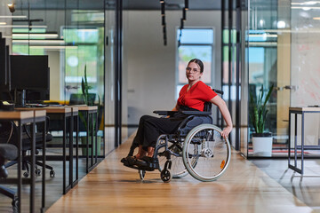 A modern young businesswoman in a wheelchair is surrounded by an inclusive workspace with glass-walled offices, embodying determination and innovation in the business world