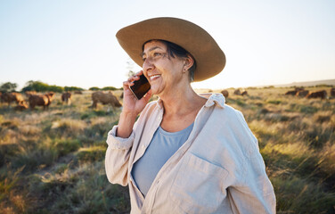Woman, farmer and phone call in countryside with cow, person and cattle on farm with smile for live...