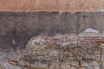 Damaged Stone And Brick Wall With Missing And Defective Mortar 