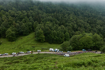 The cyclists of the Tour de France peloton is recorded by the French television helicopter during the ascent to Col de Soudet, in the French Pyrenees region