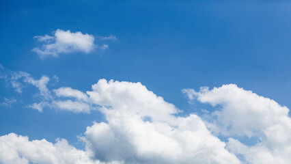 White clouds on blue sky, weather concept