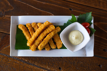 Fried Crispy Fish on the Wood Table, Appetizer or Snack Before Meal