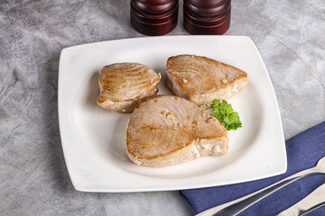 Roasted red tuna steak in the plate