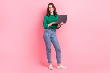 Full body portrait of positive lovely lady hold use wireless netbook coworking isolated on pink color background