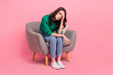 Obraz na płótnie Canvas Full length photo of unhappy tired lady wear green shirt sitting chair feeling exhasted isolated pink color background