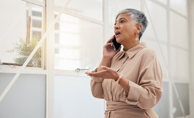 Senior woman, phone call and networking in a office with a smile and mobile conversation for work. Person, female professional and discussion from contact and communication for business online