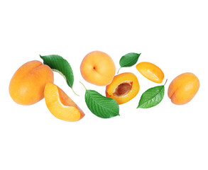 Ripe whole and sliced apricots with leaves close up in the air isolated on a white background