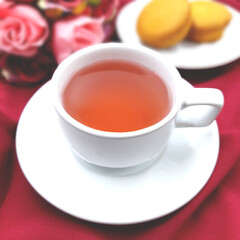 a cup of tea with blossom