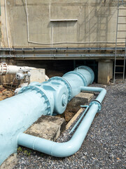 The large metal pipe from the water tank of the water filter plant.