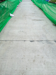 The new concrete walkway for temporary use.
