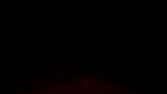 Red blinking leak flare, red gradient glare flickers on black background for overlay Loopable effect.