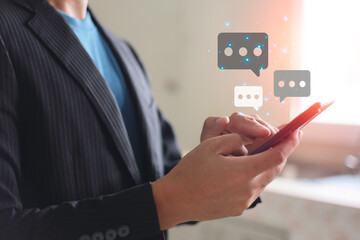Technology, communication, Social media text messaging concepts, Businessman using smartphone