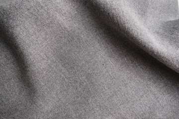 Background texture in dark gray and light gray colors. Gray fabric texture and place for text