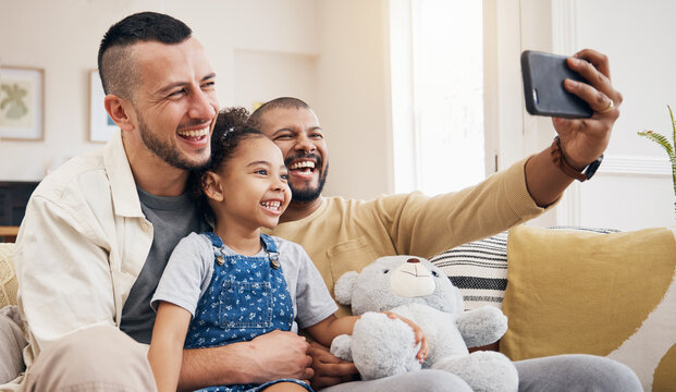 Gay family, selfie and child on home sofa for video call, social media and internet. Lgbt men or parents with kid together on a couch for streaming, profile picture and adoption memory with happiness