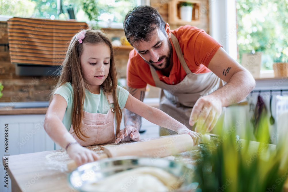 Sticker Father and daughter make cookies together in kitchen