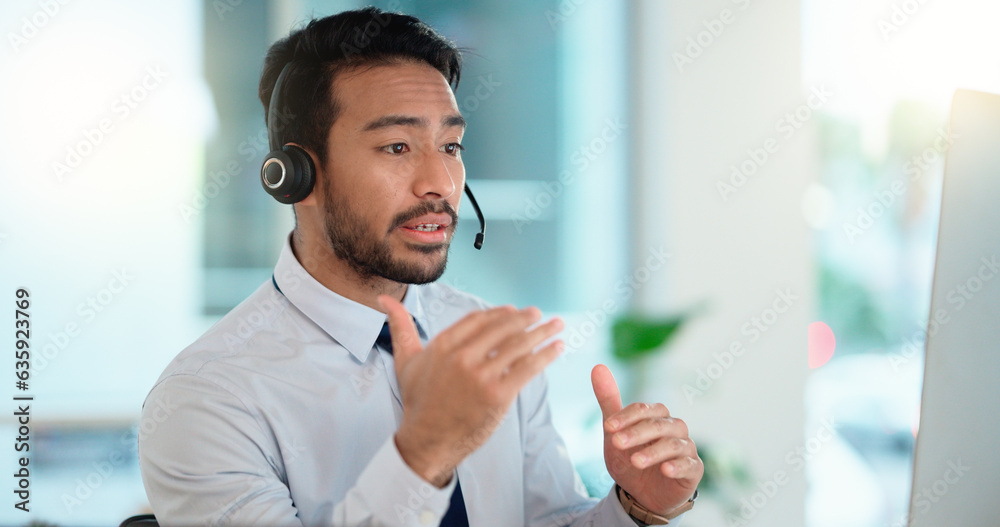Poster call center agent consulting a buyer via video call in an office. a young friendly sales man talking