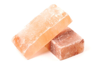 Himalayan salt stone block, crystal of natural pink salt isolated on white background