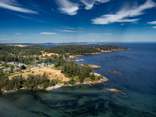 Aerial Witty's Lagoon beach taken from the Strait of Juan De Fuca overlooking Metchosin along the Southern end of Vancouver Island British Columbia Canada.