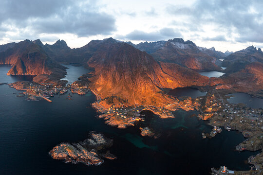 Panoramic aerial view of mountains surrounding the coastal villages of Tind and A i Lofoten, Lofoten Islands, Nordland, Norway, Scandinavia