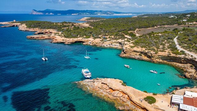 Aerial of Comte beach with its turquoise waters, Ibiza, Balearic Islands, Spain, Mediterranean