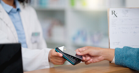 Closeup customer hands using ebanking credit card to pay on contactless nfc machine to collect...