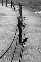 Fototapeta premium A steel security fence in a black and white.