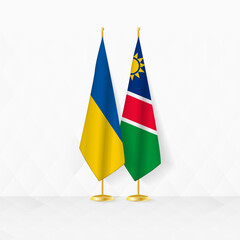 Ukraine and Namibia flags on flag stand, illustration for diplomacy and other meeting between Ukraine and Namibia.