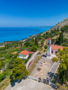 Aerial view of Greek Orthodox Church and coastline near Zola, Kefalonia, Ionian Islands, Greek Islands, Greece