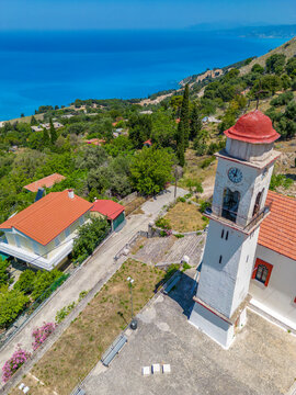 Aerial view of Greek Orthodox Church and coastline near Zola, Kefalonia, Ionian Islands, Greek Islands, Greece