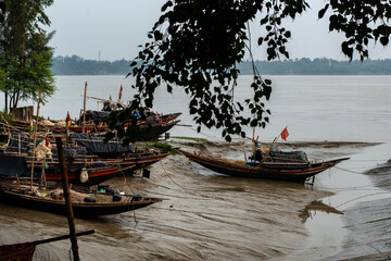 Few fishing boats anchored on the bank of river Ganga for taking rest.