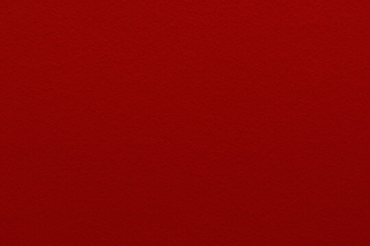 Red paper texture background.  The concept of Christmas, New Year, Valentine, Halloween, Chinese national colour and all celebration backgrounds.